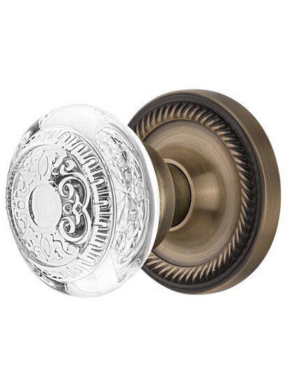Rope Rosette Door Set with Egg and Dart Crystal-Glass Knobs in Antique Brass.